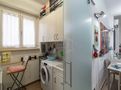 Appartamento con negozio e rimessa in Via Soana (TO)